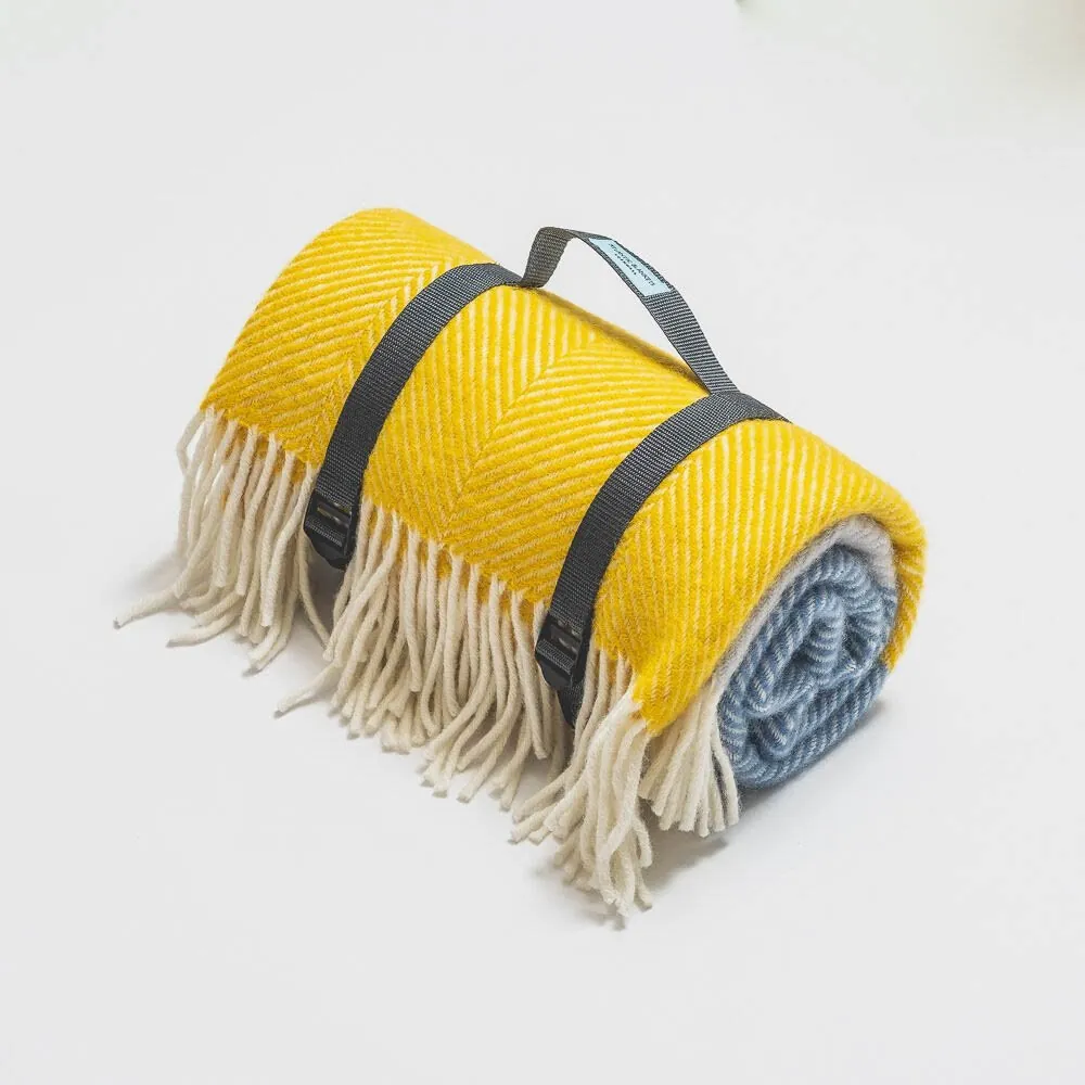 Rolled yellow wool blanket on white, clean e-commerce product photography in Cornwall
